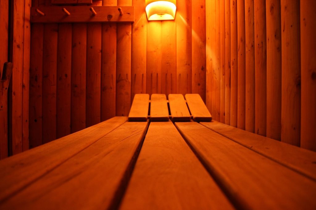 The sauna and steam room, lined in timber